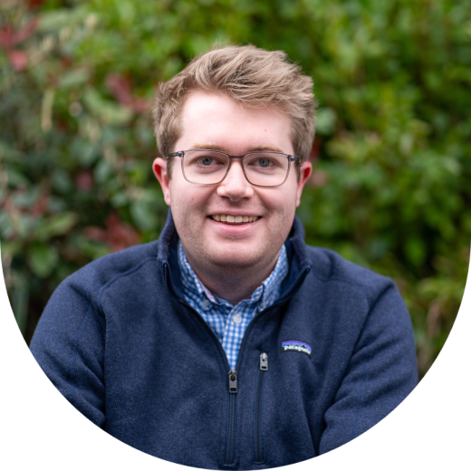 Man with fair hair and glasses